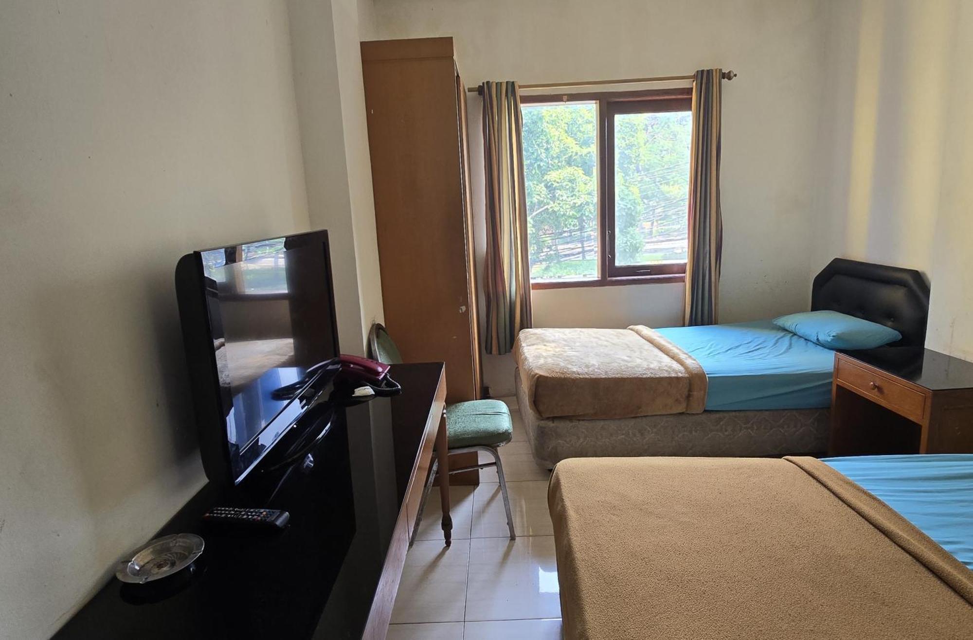 Hotel Maxim Kwitang Dżakarta Pokój zdjęcie